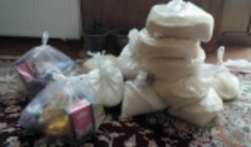 توزیع بسته‌های معیشتی به همت کارکنان اداره منابع طبيعي شهرستان بافق