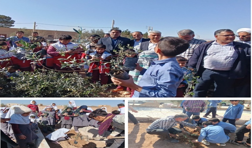کشت نهال با حضور رئیس آموزش و پرورش  و دانش اموزان اشکذر در روز درختکاری 