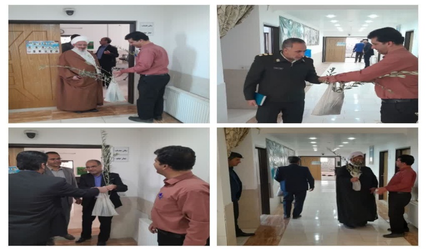 وزیع نهال زیتون به امام جمعه و اعضای جلسه شورای اداری پس از جلسه شورای اداری شهرستان تفت توسط کارکنان اداره منابع طبیعی و آبخیزداری شهرستان تفت